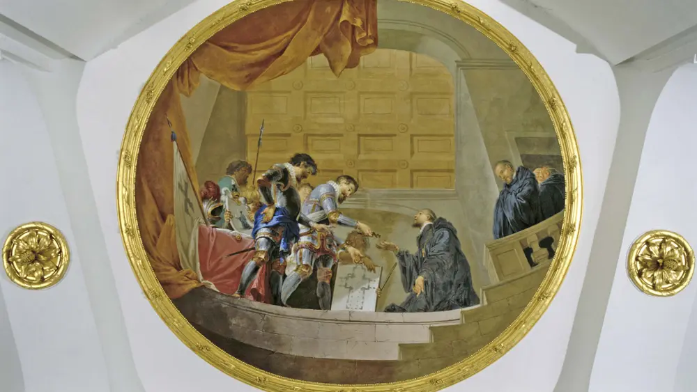 Das Fresko stammt von Januarius Zick aus dem Jahre 1781 und stellt die Übergabe von Kloster, Klosterkirche und Kreuzpartikel an Abt Werner durch die Stifter dar.