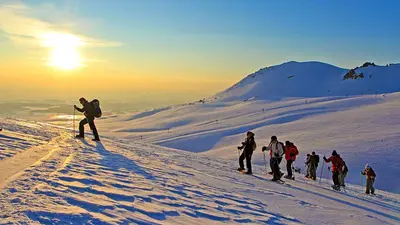 Schneeschuhwanderer in Super Besse
