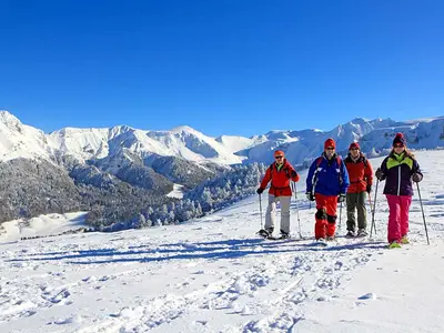 Schneeschuhwanderer in Mont Dore © OT Massif du Sancy