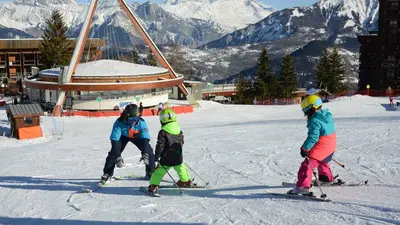 Familien auf der Piste in Le Corbier
