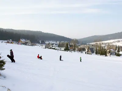 Schlittenfahrer auf den Pisten von Carlsfeld © Fremdenverkehrsverein Carlsfeld