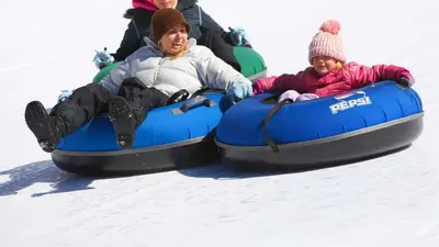 Spaß beim Snowtubing