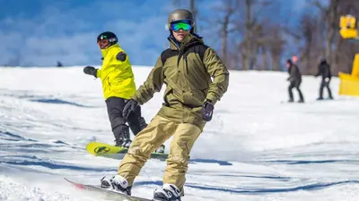 Snowboarder auf der Piste