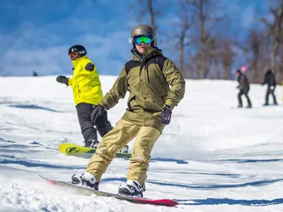 Snowboarder auf der Piste © Whitetail Resort