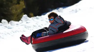 Spaß auf der Tubing Bahn