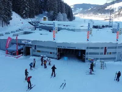 Bild INTERSPORT - Talstation der roten 8er Gondel / Tourenski Testcenter