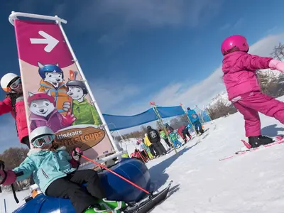 Kinder im Pra Loup Park © Manu Molle/arc en ciel