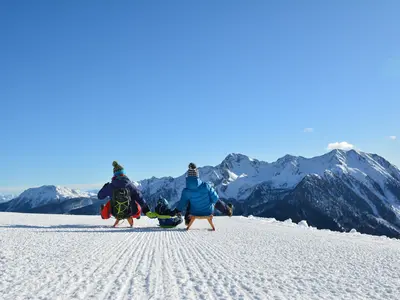 Familie beim Rodeln auf der Schwemmalm © Schwemmalm / Margot Breitenberger