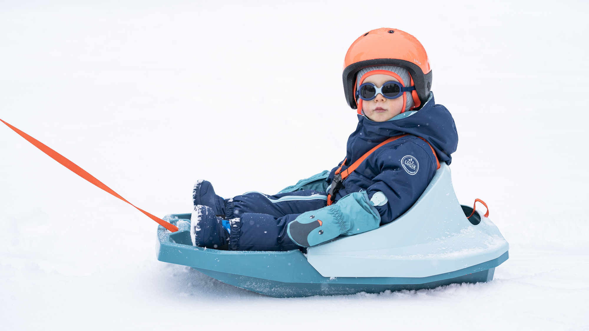 Kleinkind im Trilugik-Schlitten