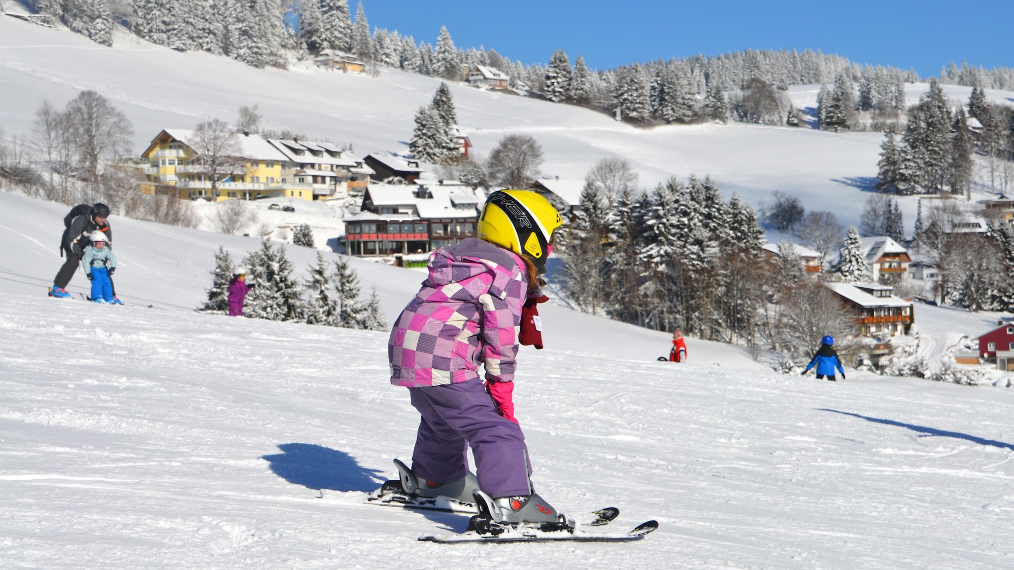 Kinder auf den Pisten