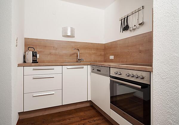 Küche mit Zugang zur Terrasse/Balkon