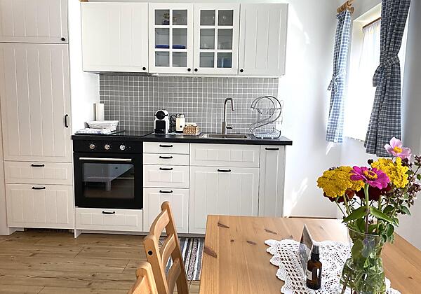 Apartment Resi Wohnraum mit Tisch