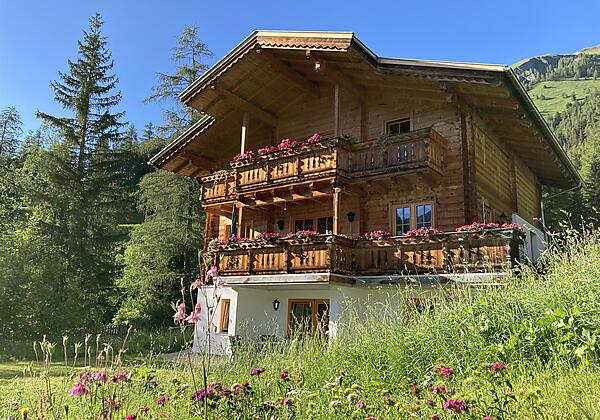 App-Evi-Haus-und-Berge-Wi-2026