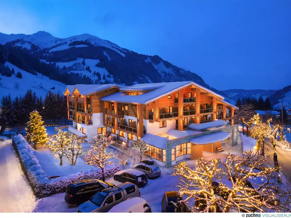3490HotelAlpinaRauris_AussenEinpassungWinterAbend_03jpg.jpg