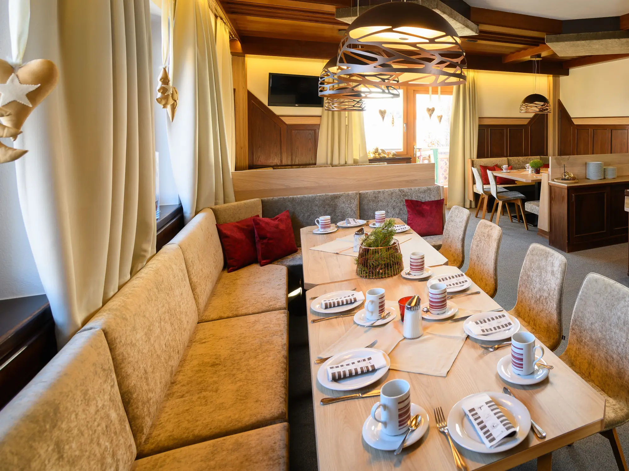 Der Frühstücksraum im Harmls Aparthotel