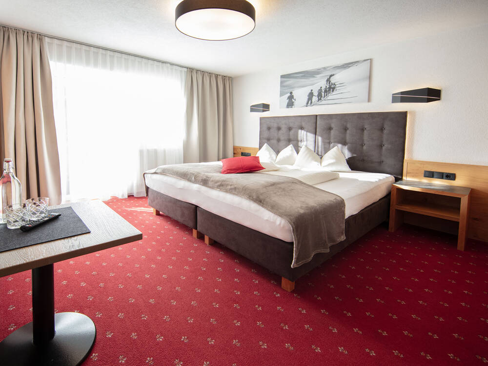 Ein Schlafzimmer des Appartements 1 im GB Gondelblick in Sölden