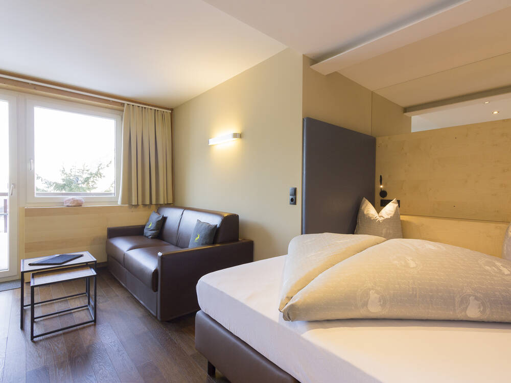 Einladende Zimmer im Wohlfühlhotel Hubertushof in Stuben am Arlberg