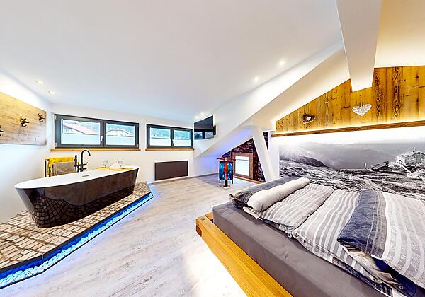 Schlafzimmer mit eigener Whirlwanne