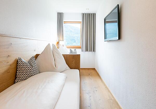 Schlafzimmer mit getrennten Betten