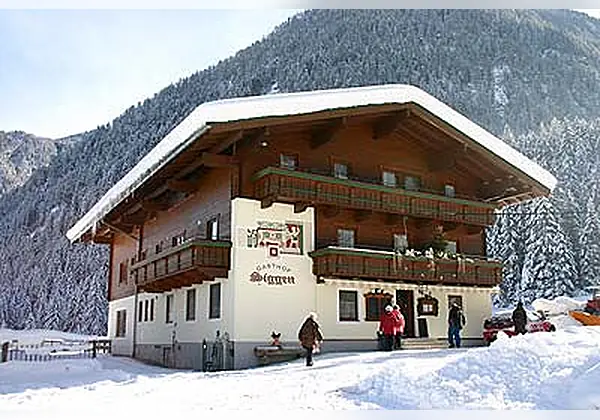 Aussenansicht vom Hotel Gasthof Siggen im Winter