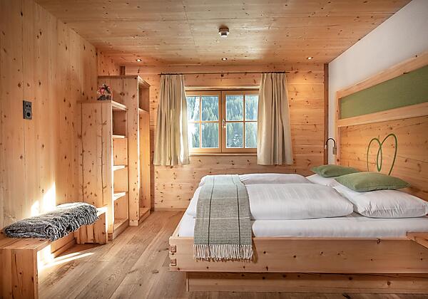 Schlafzimmer in den großen Almsuiten