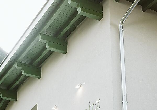 Ansicht Schriftzug Hauswand