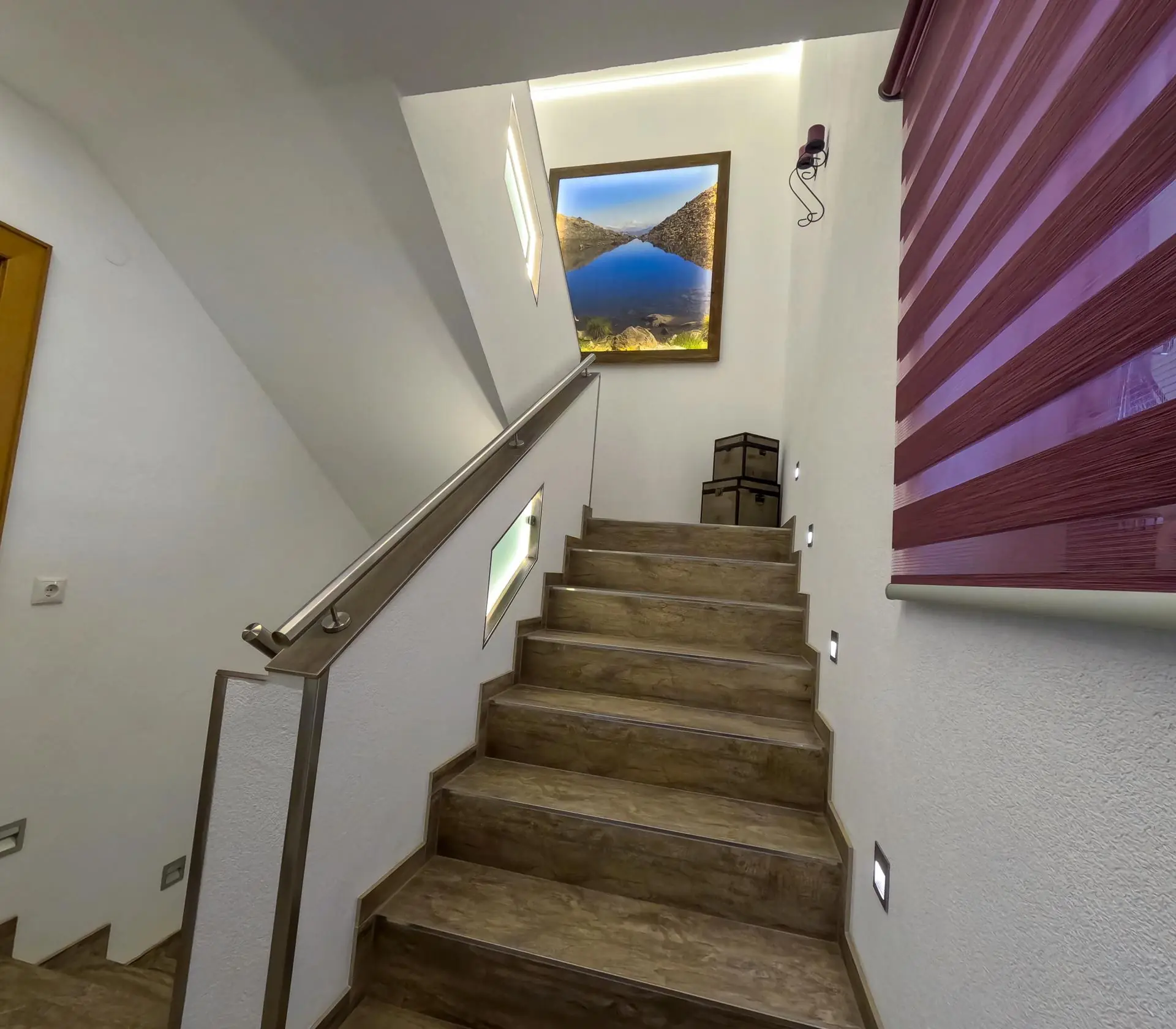 Stiegenaufgang zur Ferienwohnung im 1. Stock