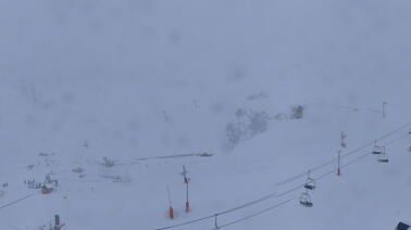 Blick auf das Dorf und einen Sessellift (1.758 m)